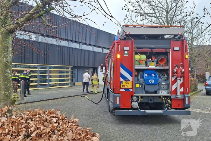 Rookontwikkeling in kerk door TL-balk