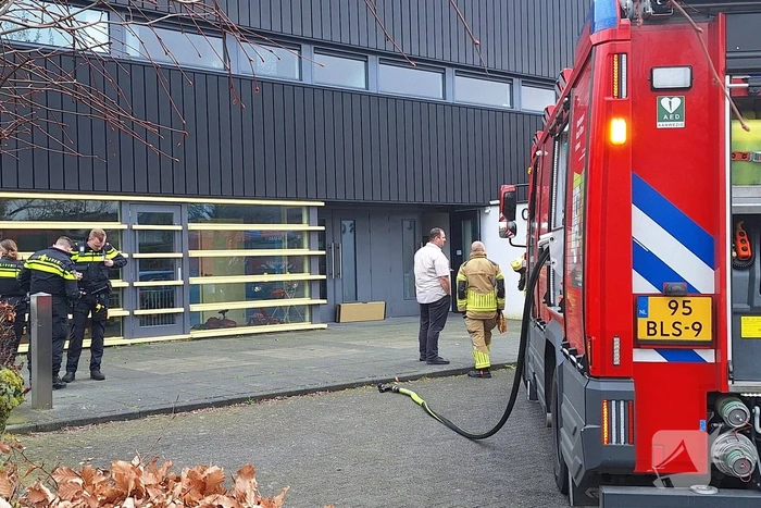 Rookontwikkeling in kerk door TL-balk