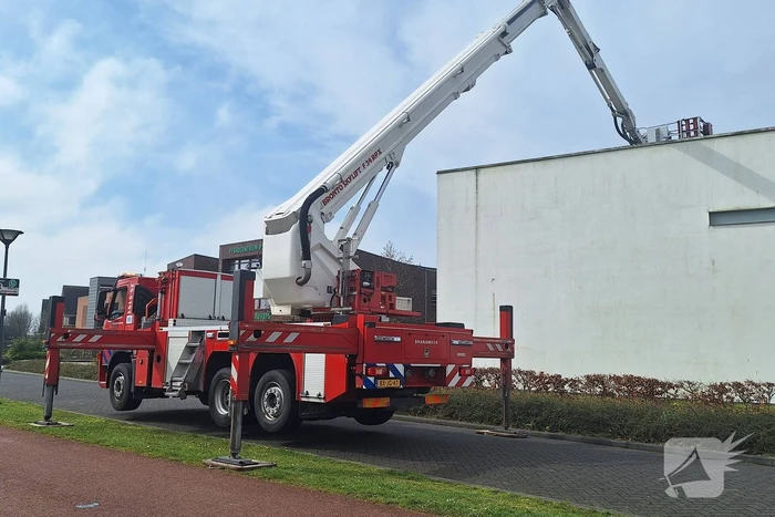 Rookontwikkeling in kerk door TL-balk