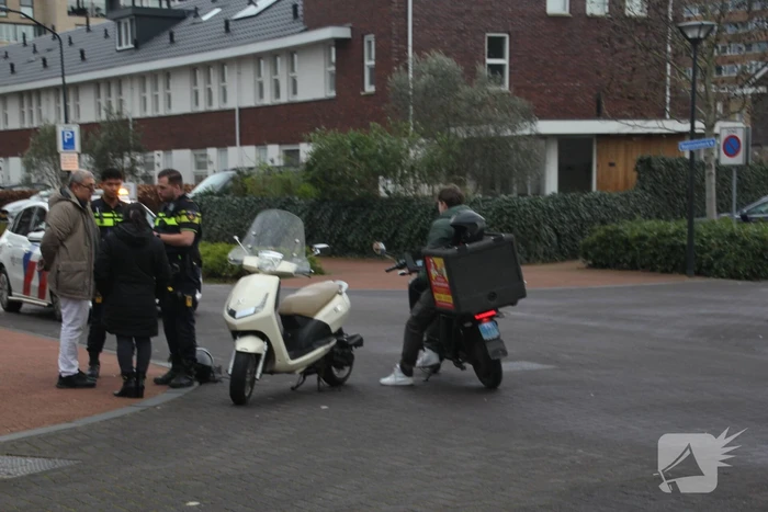 Scooters in botsing op kruising
