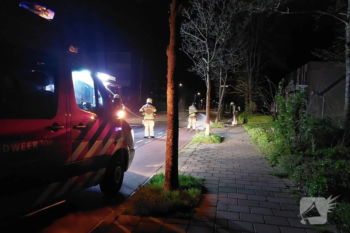 Huisvuilcontainer vat vlam