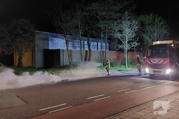 Huisvuilcontainer vat vlam