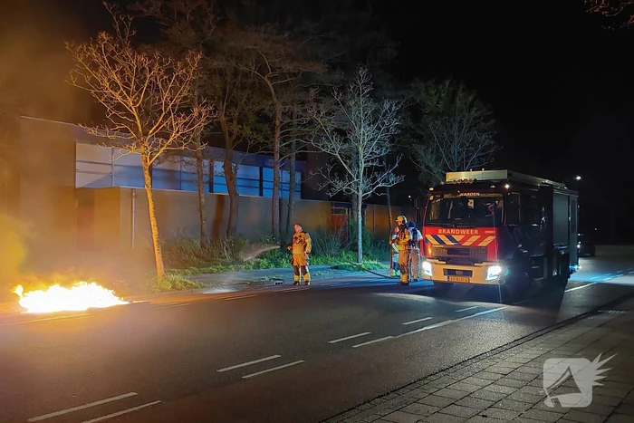 Huisvuilcontainer vat vlam