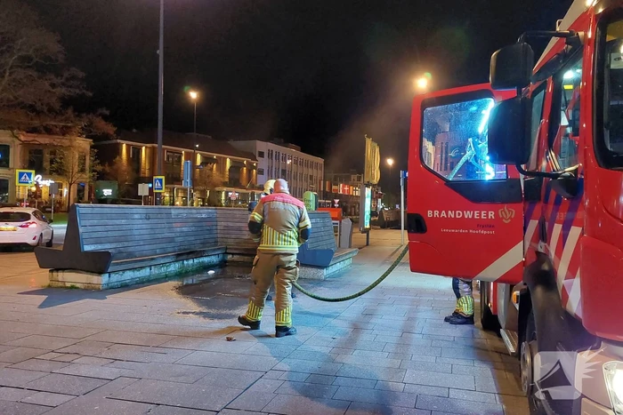 Afval in brand op stationsplein