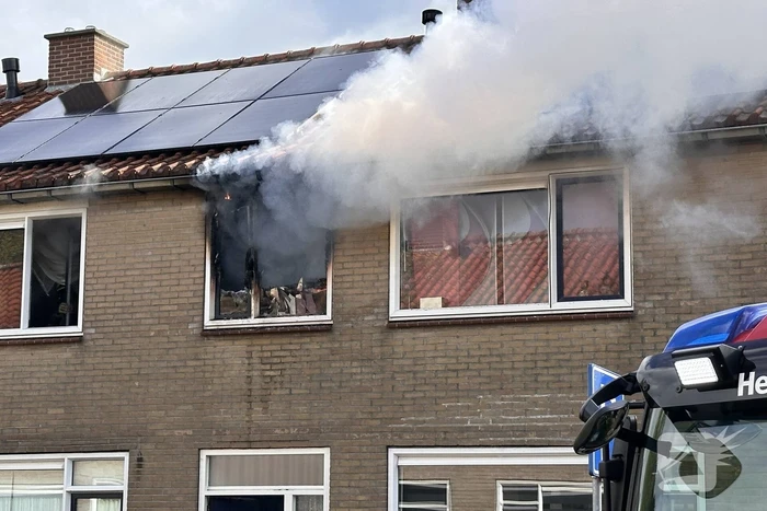 Fikse rookontwikkeling bij woningbrand