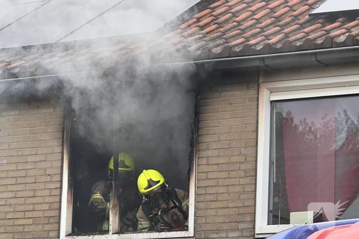 Fikse rookontwikkeling bij woningbrand