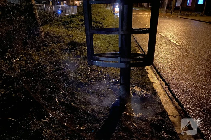 Reclamebord in brand gestoken