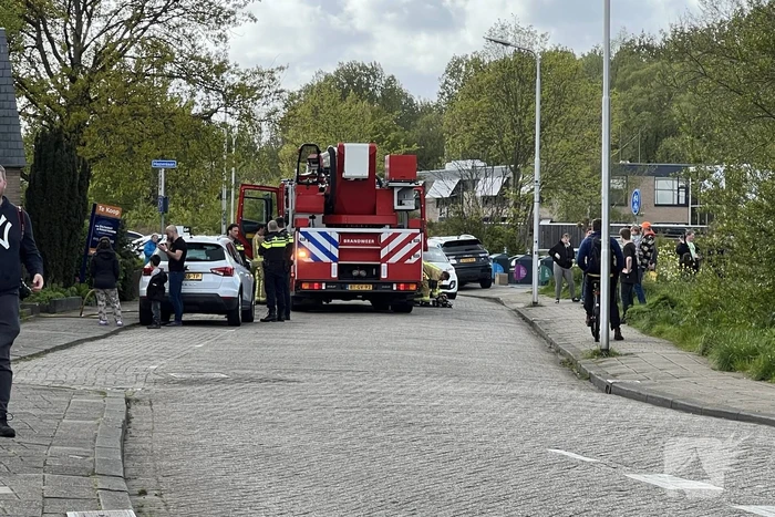 Brandweer blust woningbrand
