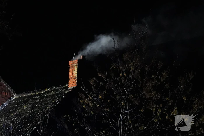 Veel rook bij schoorsteenbrand