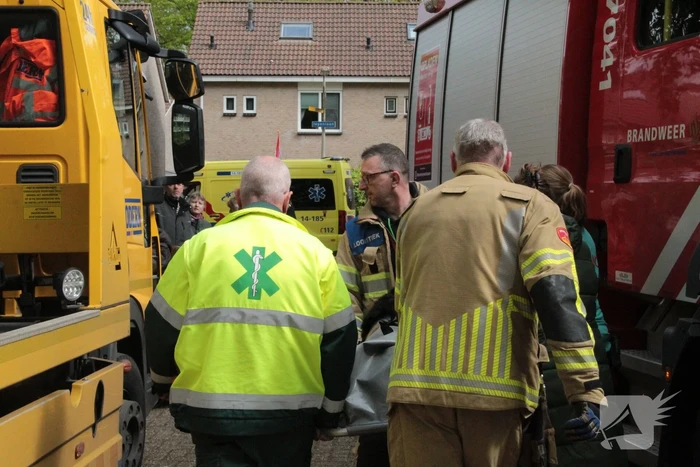 Hond gered door brandweer bij woningbrand