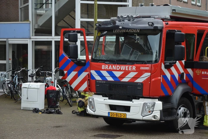 Brandweer ventileert appartement na brand in droger