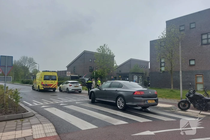 Automobilist en E-biker in botsing
