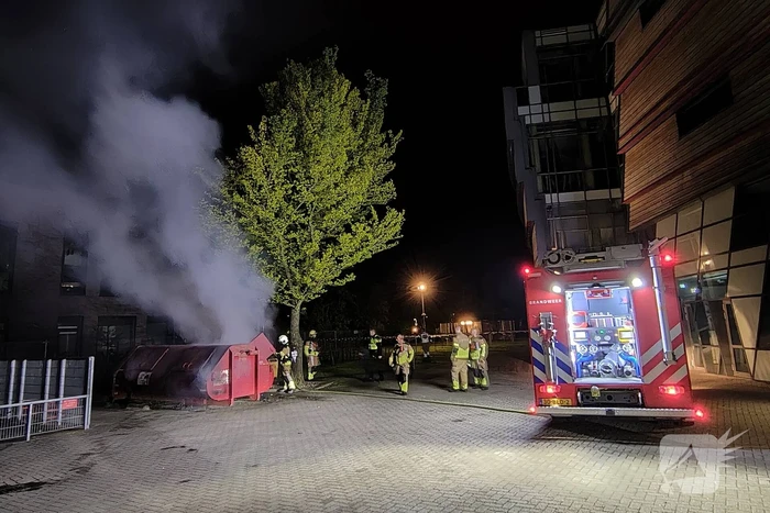 Flinke rookontwikkeling bij brand in container