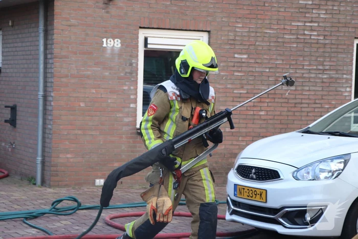 Autobrand slaat over naar buren