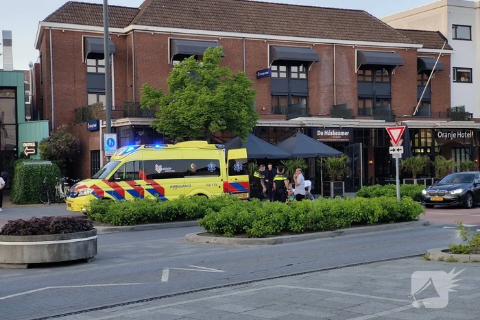 Voetganger en automobilist in botsing