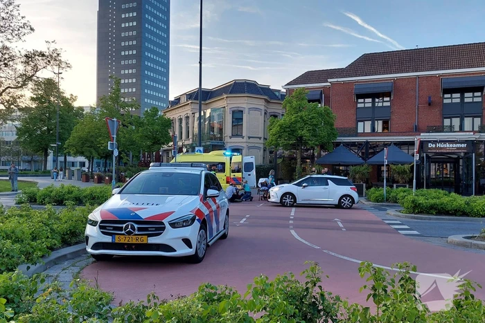 Voetganger en automobilist in botsing