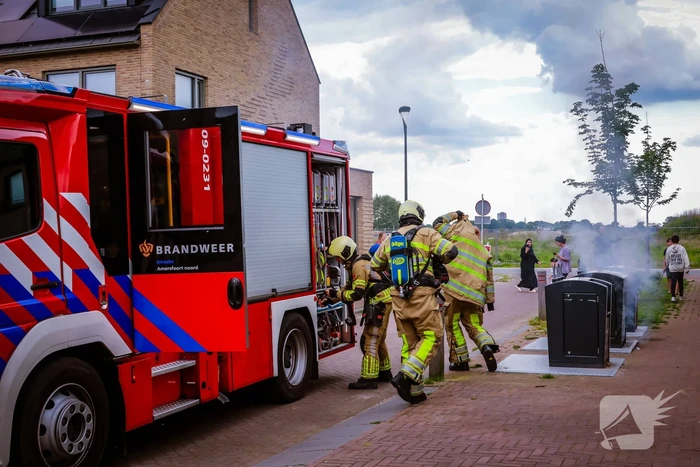 Brand in ondergrondse container