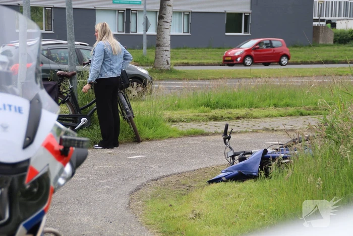 Twee fietsers met elkaar in botsing