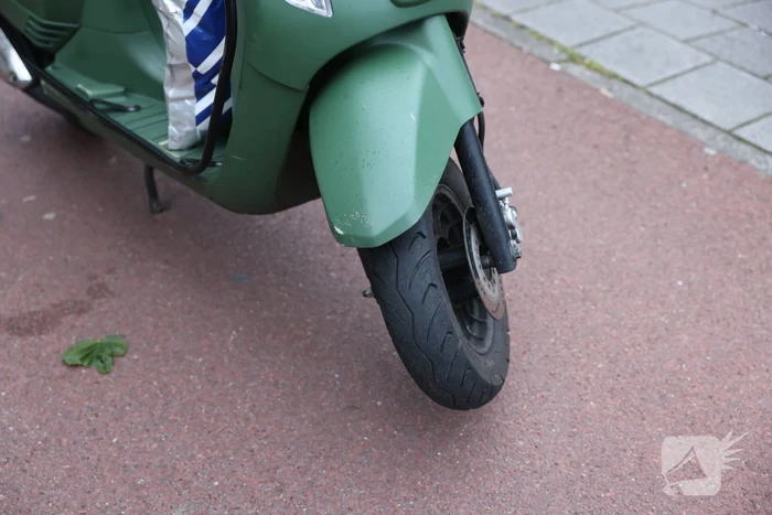 Aanrijding tussen scooter en auto