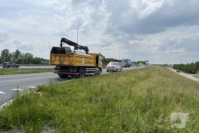 Auto te water na frontale aanrijding met vrachtwagen