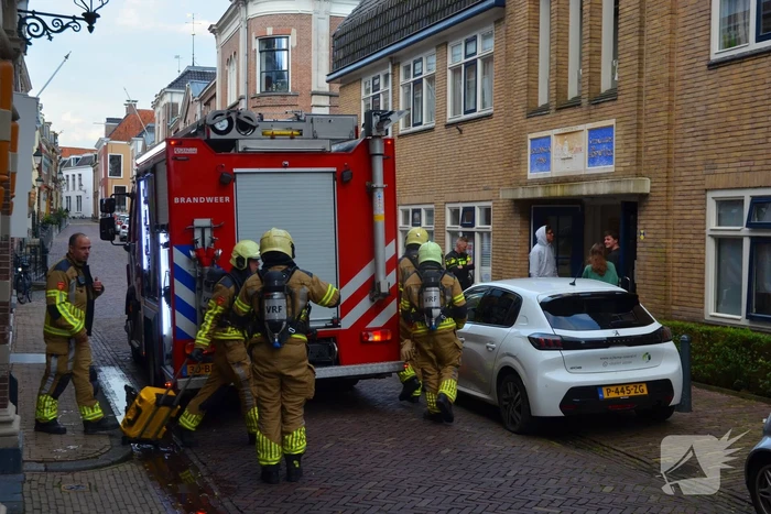 Appartement vol rook door keukenbrand