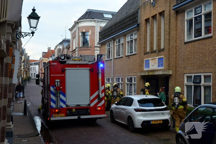 Appartement vol rook door keukenbrand