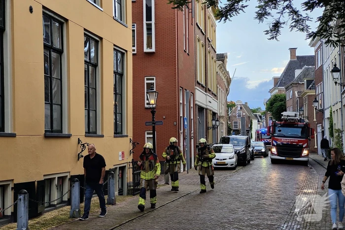 Appartement vol rook door keukenbrand