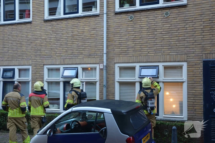 Appartement vol rook door keukenbrand