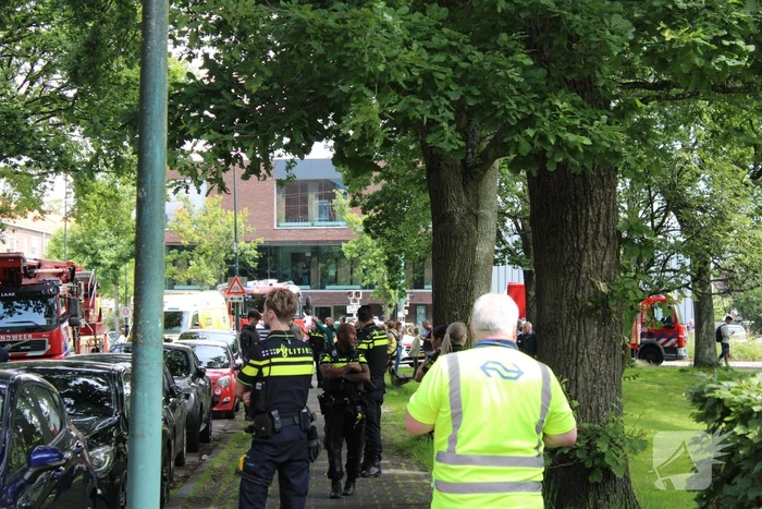 Grote brand in portiekwoning