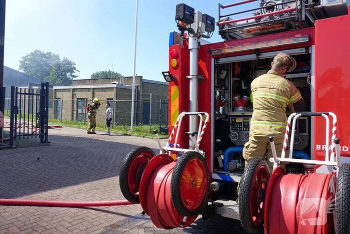 Flinke brand bij bedrijfspand in container