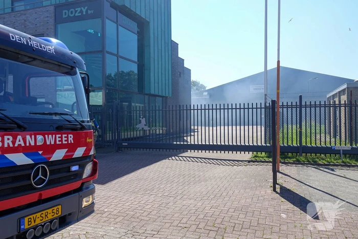 Flinke brand bij bedrijfspand in container