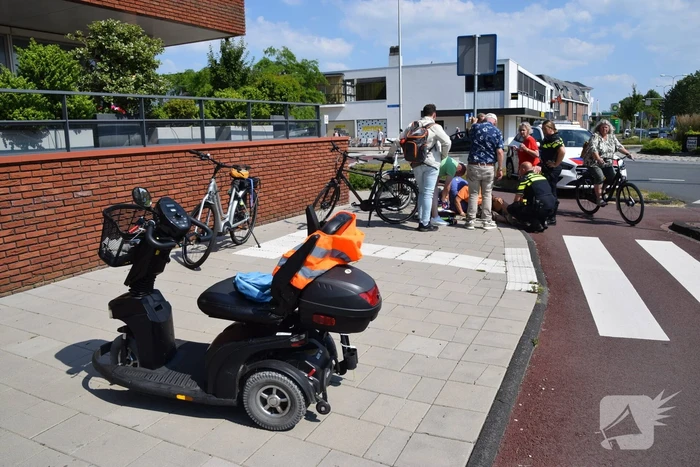 Fietsster gewond bij botsing met scootmobieler