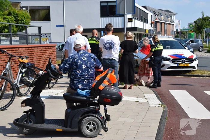 Fietsster gewond bij botsing met scootmobieler