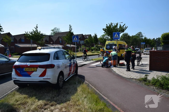 Fietsster gewond bij botsing met scootmobieler