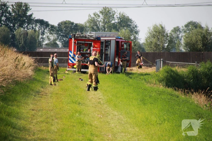 Middelbrand na bermbrand langs spoor
