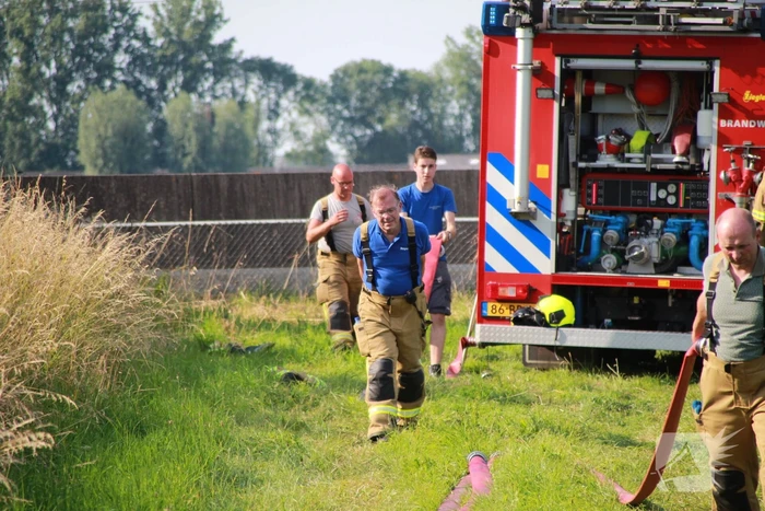 Middelbrand na bermbrand langs spoor