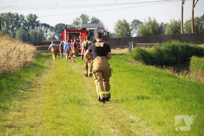 Middelbrand na bermbrand langs spoor