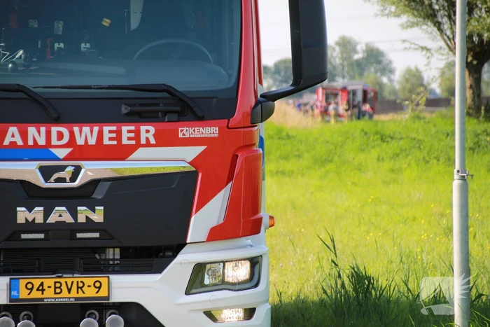 Middelbrand na bermbrand langs spoor