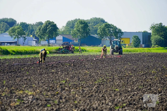 Grote rookwolken door brand in tractor