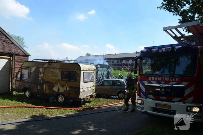 Uitslaande brand in grote loods
