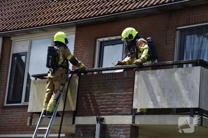 Airco unit op balkon vliegt in brand