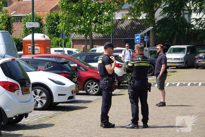 Kortsluiting onder motorkop zorgt voor brand