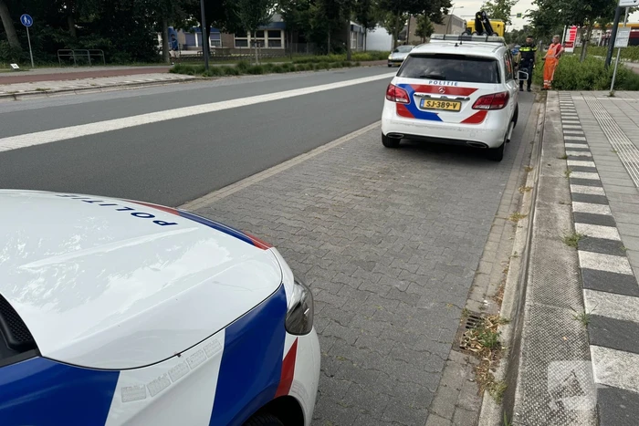 Politieauto zwaar beschadigd door botsing