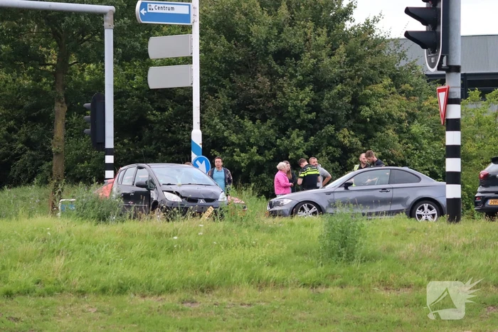 Schade na botsing op kruising