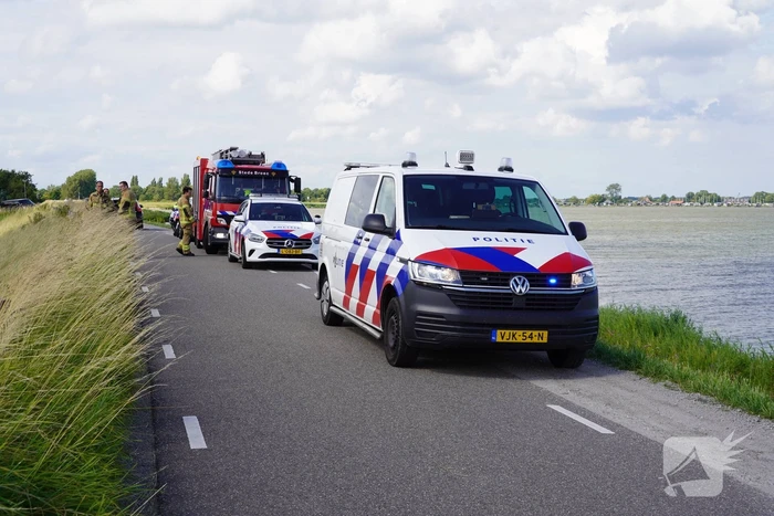 Bestuurder gewond na crash van dijk