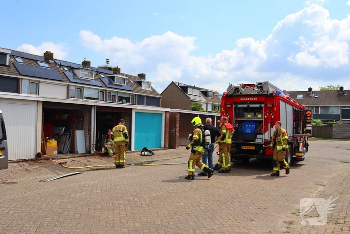 Brand in garage door laswerkzaamheden