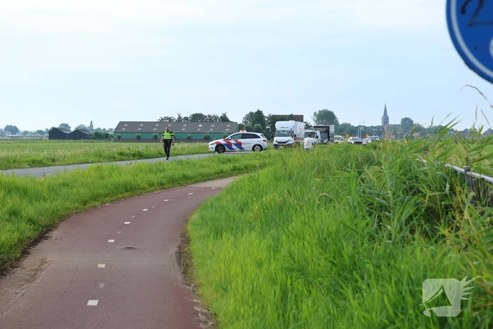 Racefietser en auto betrokken bij aanrijding