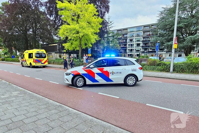Persoon op driewieler ten val