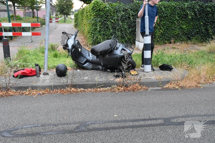 Motorrijder en scooterrijder botsen op elkaar