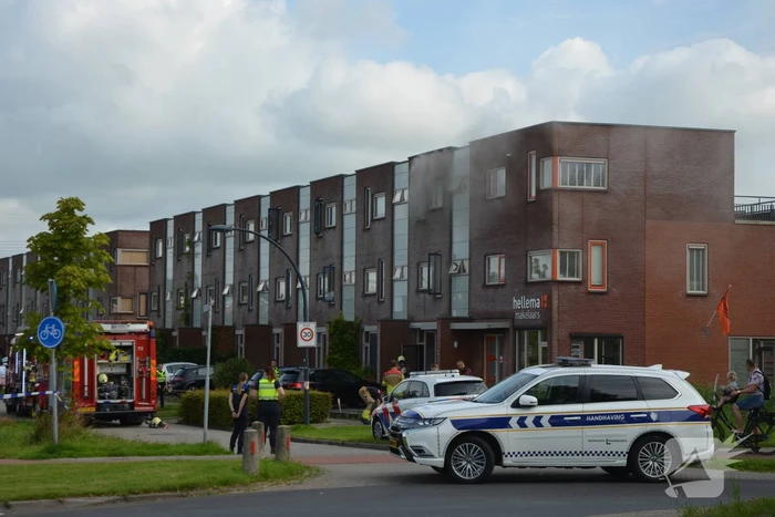 Forse rookontwikkeling bij woningbrand